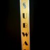 Golden Subway Sign